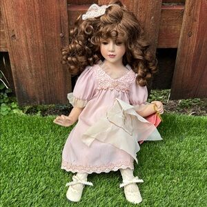 Charming Doll in Pink Dress with Curly Hair